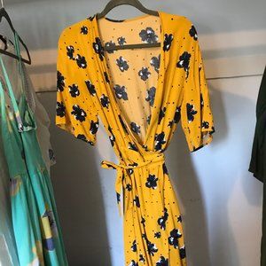 Yellow wrap dress with blue flowers